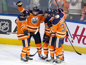 The Edmonton Oilers' celebrate a goal by Derek Ryan (10) during third period NHL action against the New Jersey Devils at Rogers Place in Edmonton on Saturday March 19, 2022. The Oilers won 6 to 3.