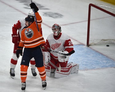 Edmonton Oilers Devin Shore (14) celebrates scoring on Detroit Red Wings goalie Thomas Greiss (29) during NHL action at Rogers Place in Edmonton, March 15, 2022.