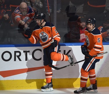 Edmonton Oilers Zach Hyman (18) celebrates his goal with Cody Ceci (5) against the Detroit Red Wings during NHL action at Rogers Place in Edmonton, March 15, 2022.