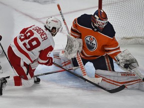 Edmonton Oilers goalie Mikko Koskinen (19) makes the glove save off Detroit Red Wings Sam Gagner (89) during NHL action at Rogers Place in Edmonton on March 15, 2022.