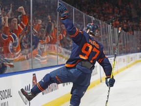 Edmonton Oilers forward Connor McDavid (97) celebrates his goal against the Arizona Coyotes at Rogers Place on Monday, March 28, 2022.