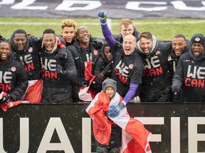 The Canadian mens national team celebrate after defeating Jamaica 4-0 in their World Cup Qualifying match at BMO Field in Toronto, Ontario, Canada on March 27, 2022.