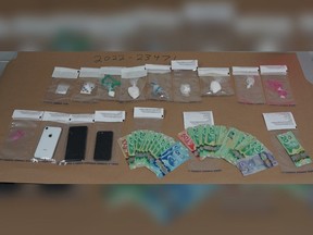 St. Albert RCMP's drug unit seized $900 in cash as well as cocaine, crack and fentanyl in a drug trafficking investigation.