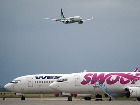 Flair Airlines inaugural flight of its new Boeing 737 MAX 8 aircraft comes in for a landing at Edmonton International Airport on Thursday June 10, 2021. It was the first of 13 new Boeing 737 MAX 8 aircraft that Flair Airlines is adding to its fleet.