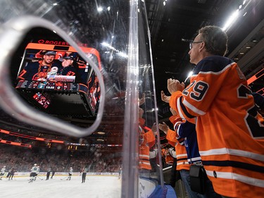Edmonton Oilers fans cheer for five-year-old Ben Stelter, who has glioblastoma, a type of brain cancer, while the team plays the San Jose Sharks during first period NHL action at Rogers Place in Edmonton, on Thursday, April 28, 2022.