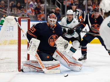 Edmonton Oilers’ goaltender Mikko Koskinen (19) stops San Jose Sharks’ Noah Gregor (73) during second period NHL action at Rogers Place in Edmonton, on Thursday, April 28, 2022.