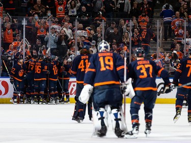 The Edmonton Oilers celebrate their overtime win over the San Jose Sharks at a NHL game at Rogers Place in Edmonton, on Thursday, April 28, 2022.