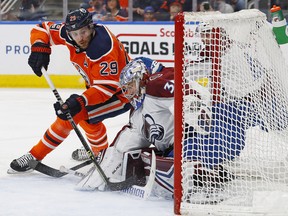 Colorado Avalanche goaltender Darcy Kuemper (35) makes a save on Edmonton Oilers forward Leon Draisaitl (29) at Rogers Place on Friday, Apr 22, 2022.