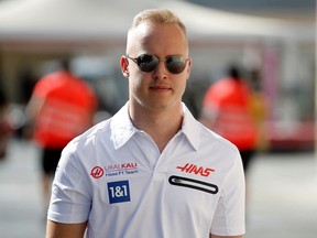 Nikita Mazepin arrives at the track ahead of the 2021 Abu Dhabi Grand Prix. Haas' Nikita Mazepin arrives ahead of the Abu Dhabi Grand Prix REUTERS/Hamad I Mohammed/File Photo