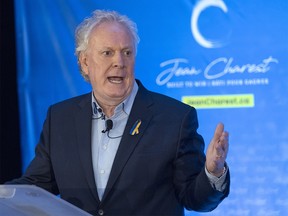 Jean Charest speaks to supporters Thursday, March 24, 2022 in Laval, Quebec.