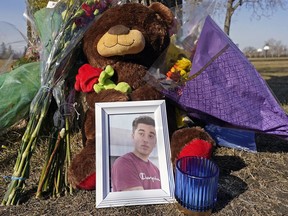 A memorial outside McNally High School in Edmonton, where student Karanveer Sahota was fatally wounded earlier this month. Seven youth were charged with murder in the 16-year-old's death.