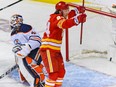 The Calgary Flames' Brett Ritchie scores a goal against Edmonton Oilers goalie Mike Smith during the first game of their second round playoff series at Scotiabank Saddledome on Wednesday, May 18, 2022.