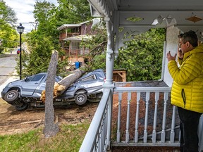 Marc-Andre Ouellet's Mercedes camper van was smashed by a fallen tree in his driveway in Morin-Heights on Tuesday May 24, 2022 due to the storm that passed through town over the weekend.