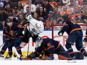Edmonton Oilers goaltender Mike Smith (41) makes a save on L.A. Kings' Quinton Byfield (55) during first period NHL action in Game 2 of their first round Stanley Cup playoff series in Edmonton, on Wednesday, May 4, 2022.