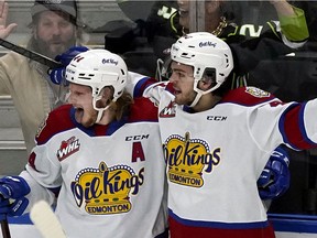 Edmonton Oil Kings Carter Souch (44) and Jaxsen Wiebe (43) celebrate Wiebe's second period goal against the Red Deer Rebels during WHL playoff game action in Edmonton on Saturday May 7, 2022.