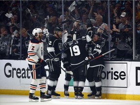 Troy Stecher #51 of the Los Angeles Kings celebrates his goal in front of Duncan Keith #2 of the Edmonton Oilers in the first period of Game Four of the First Round of the 2022 Stanley Cup Playoffs at Crypto.com Arena on May 08, 2022 in Los Angeles, California.