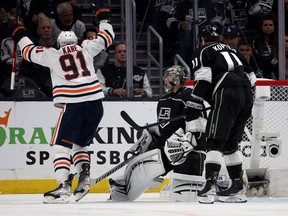 Evander Kane (91) of the Edmonton Oilers celebrates his goal in front of Jonathan Quick (32) and Anze Kopitar (11) of the Los Angeles Kings in Game 6 of the first round of the 2022 Stanley Cup playoffs at Crypto.com Arena on May 12, 2022, in Los Angeles.