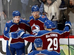 DENVER, COLORADO - MAY 31: Cale Makar #8 of the Colorado Avalanche celebrates with Valeri Nichushkin #13 and Nathan MacKinnon #29 after scoring a goal against the Edmonton Oilers during the first period in Game One of the Western Conference Final of the 2022 Stanley Cup Playoffs at Ball Arena on May 31, 2022 in Denver, Colorado.