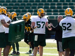 Edmonton Elks centre David Beard (57) takes part in drills during the first day of Edmonton Elks training camp at Commonwealth Stadium in Edmonton on Sunday, May 15, 2022.