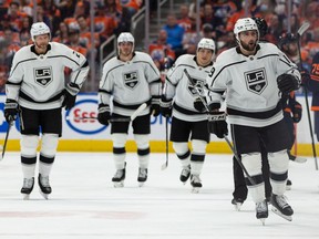 L.A. Kings' Alex Iafallo (19) celebrates a goal with teammates on Edmonton Oilers' goaltender Mike Smith (41) during first period of NHL playoff action at Rogers Place in Edmonton, on Monday, May 2, 2022. Photo by Ian Kucerak