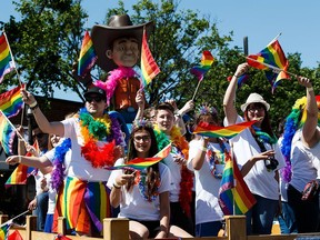 People take part during the 2016 Edmonton Pride Festival Parade in Old Strathcona in Edmonton, on Saturday, June 4, 2016.