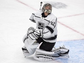 Los Angeles Kings goaltender Jonathan Quick (32) looks for the puck against the Edmonton Oilers on Tuesday, May 10, 2022, in Edmonton.