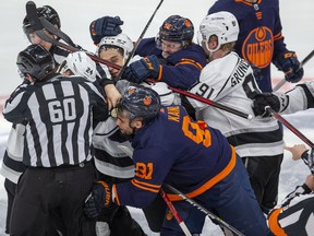 Edmonton Oilers forward Evander Kane (91) mixes it up with the Los Angeles Kings on Tuesday, May 10, 2022, in Edmonton.