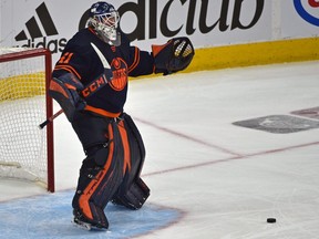 Edmonton Oilers goalie Mike Smith  reacts after a defensive zone clearance by the Calgary Flames resulted in a goal that tied the game on May 24, 2022 at Rogers Place in Edmonton.