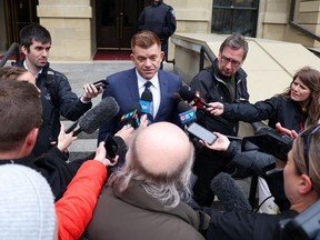 Fort McMurray-Lac La Biche MLA Brian Jean speaks with media at McDougall Centre in Calgary before a UCP caucus meeting on May 19, 2022.