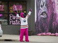 Marcia Lee wears a pink gorilla costume and a Connor McDavid jersey as she promotes an Edmonton Oilers playoff watch party at the Pink Gorilla Pizzeria, 7018 109 St., in Edmonton.