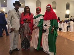 Somaliland Independence Day celebration organizer Abdullahi Mohamed, left, poses at the 2018 celebration in Edmonton with attendees Kaltun Sahal, Nima Askar and Anran Hassan.