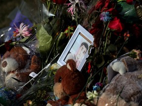 A memorial for Karanveer Singh Sahota, 16, outside McNally High School, in Edmonton, Sunday April 24, 2022. A funeral service for Sahota, 16, was held Sunday. An autopsy found Sahota died from a stab wound to his chest after he was attacked near a bus stop outside McNally High School on April 8.