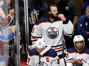 Mike Smith (41) of the Edmonton Oilers takes a seat on the bench after being pulled against the Colorado Avalanche in Game 1 of the Western Conference final of the 2022 Stanley Cup playoffs at Ball Arena on May 31, 2022 in Denver.