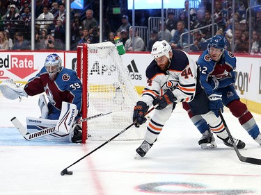 Zack Kassian #44 of the Edmonton Oilers controls the puck behind the net against Josh Manson #42 of the Colorado Avalanche during the third period in Game One of the Western Conference Final of the 2022 Stanley Cup Playoffs at Ball Arena on May 31, 2022 in Denver, Colorado.