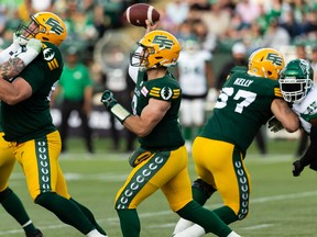 Edmonton Elks' quarterback Nick Arbuckle (9) throws the ball against the Saskatchewan Roughriders during first half CFL action at Commonwealth Stadium in Edmonton, on Saturday, June 18, 2022. Photo by Ian Kucerak