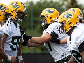 Centre David Beard (57) drills with teammates during an Edmonton Elks practice at Clarke Stadium in Edmonton on Wednesday, June 22, 2022.