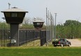 A corrections vehicle drives around the outside fence at the Edmonton Institution, 21611 Meridian Street. Two Muslim community groups are calling on the Correctional Service to end the "privatization" of religious chaplain services.