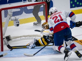 Marco Costantini (33) of the Hamilton Bulldogs makes the save against Jake Neighbours (21) of the Edmonton Oil Kings during the third period at the 2022 Memorial Cup on June 24, 2022, at Harbour Station in Saint John, NB.