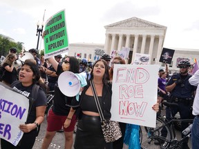 Anti-abortion demonstrators gather outside the U.S. Supreme Court in Washington, D.C., on June 24, 2022.