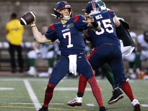 Montreal Alouettes quarterback Trevor Harris (7) throws against the Saskatchewan Roughriders in Montreal on June 23, 2022.