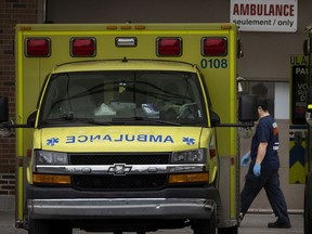 A paramedic enters the triage area of St. Mary's Hospital ER in Montreal on Oct. 14, 2021.