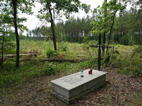 A symbolic grave in the Bialucki Forest near Ilowo on July 13, 2022 the site where the mass grave of about 8,000 Geman Nazi victims from the nearby Soldau concentration camp in Dzialdowo was unearthed at the beginning of July 2022.
