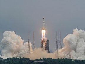 The Long March-5B Y2 rocket, carrying the core module of China's space station Tianhe, takes off from Wenchang Space Launch Center in Hainan province, China April 29, 2021.
