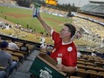 For more than 50 years, Roger Owens has been flinging peanuts to fans at Dodger Stadium.