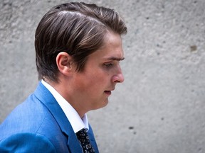 Former Vancouver Canucks NHL hockey player Jake Virtanen returns to B.C. Supreme Court after a lunch break in his sexual assault trial, in Vancouver, on Friday, July 22, 2022.