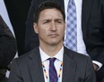 Prime Minister Justin Trudeau listens to Pope Francis deliver an apology for the Catholic Church’s role in residential schools in Canada in Maskwacis, Alta., on July 25, 2022.