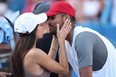 Nick Kyrgios of Australia celebrates with his girlfriend Costeen Hatzi after defeating Yoshihito Nishioka of Japan in their Men's Singles Final match during Day 9 of the Citi Open at Rock Creek Tennis Center on August 7, 2022 in Washington, DC. (