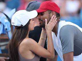 Nick Kyrgios of Australia celebrates with his girlfriend Costeen Hatzi after defeating Yoshihito Nishioka of Japan in their Men's Singles Final match during Day 9 of the Citi Open at Rock Creek Tennis Center on August 7, 2022 in Washington, DC. (