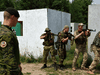 A Canadian instructor supervises the advance of Ukrainian soldiers during an exercise during Operation Unifier in Starychi, Ukraine, in June 2016. Canada began sending troops to resume the training mission in the U.K. after Russia invaded Ukraine in February.