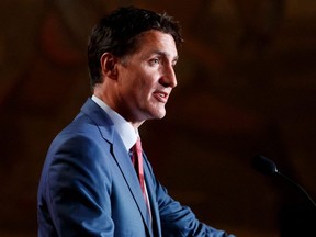 Prime Minister Justin Trudeau speaks at a welcome dinner for German Chancellor Olaf Scholz at the Royal Ontario Museum in Toronto, Monday, Aug. 22, 2022.